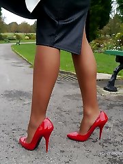 Gorgeous Kerry teases her beautiful silky nylon legs with a pair of red stiletto heels on her...