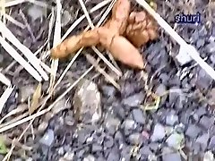 My spy camera captured an Chinese honey pissing outdoors