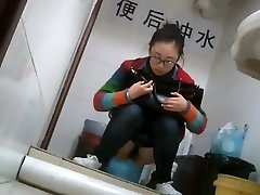 Nerdy chinese girl caught taking a leak