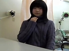 Young Japanese girl reaches an climax at her gyno.s office