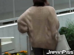 Naughty Japanese cuties urinating in the streets Naughty Japanese cuties urinating in the streets