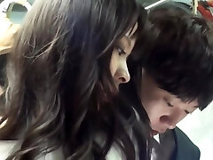 Asian beauty in dark-hued pantyhose is sucking boner and getting fucked in a public bus