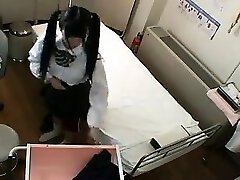 Super-cute Asian schoolgirl with pigtails has a doctor fingering 