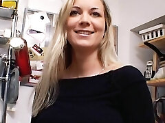 Incredible German Cougar with huge boobs dildoing her shaved muff in the kitchen