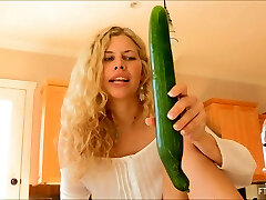 Big green veggie and a beautiful blonde girl pulverizing
