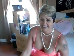 Mature and excited chunky woman flashes her milk cans on webcam