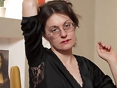 Solo brunette enjoys while fingering her shaved puss - Barbara