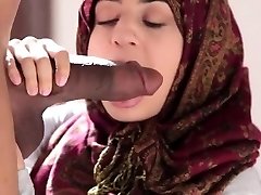 Arab babe Nadia Ali sucks and gets fucked by big ebony man meat