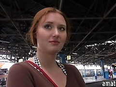 Ginger-haired Eurobabe flashes her big tits in bus station