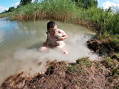 Unshaved Brunette Rubbing her Pussy with a Mud