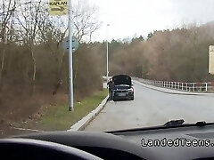 Redhead teen demonstrating big tits to stranger in his car