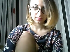 Beautiful woman with glasses easily fist her pussy