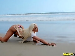 Busty platinum-blonde bombshell Nicolette Shea rides cock outdoors