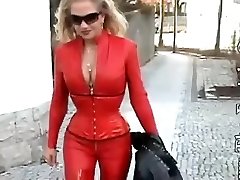 Latex glamour porno video with slut dressed in red
