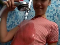Euro teen with small bumpers taking a Shower solo