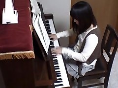 Piano teacher rear penetrates his pupil throughout the piano keys