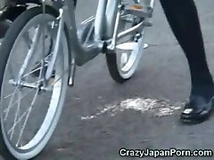 College Girl Bursts on a Bike in Public! 