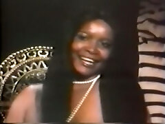 Delicious and pretty vintage black doll with enormous breasts