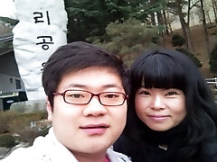 Amateur Korean couple porks in classic missionary position on camera