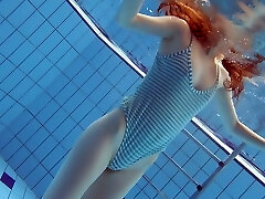 Slim beauty Libuse swimming naked in a pool in exciting hump video
