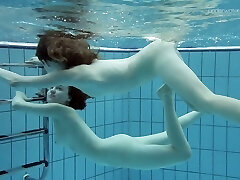 Lovely teen chick Anna Netrebko swims naked with her GF