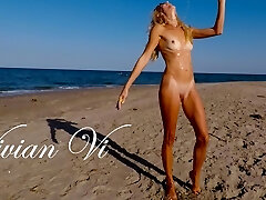 Nude Workout on the beach - a glorious skinny milf with small tits