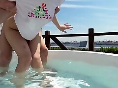 Young Japanese chick is fucked in the pool and indoor