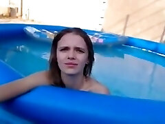 College chick with petite boobs gets fucked in the pool