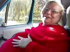 Messy BBW grandma of my wife shows off her flabby juggs in car