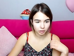 Lil brunette posing on webcam