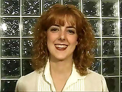 Ginger-haired strips down and fondles her boobs and cunt