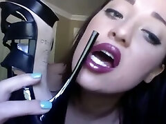 Goth cam dame with adorable face licks her new high heel shoes