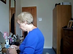 Wearing a blue skirt and flashing her jugs Wearing a blue skirt and flashing her jugs