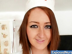 Sexy ginger-haired nurse in latex uniform gets nasty