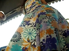 Sweetie in a flowery dress makes for hot upskirt magic