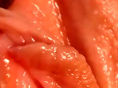 Close up of hot pink wet coochie and clit