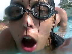 Lecherous stunner Candy gives a blow-job underwater and gets fucked in the pool