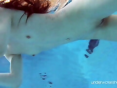 Roxalana Cheh sexy red-haired underwater
