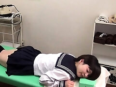 Japanese teen in college girl uniform stripped