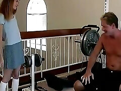 Skinny Scarcely Legal Slut Sucks a Hard Cock on a Weight Bench Then Gets Torn Up