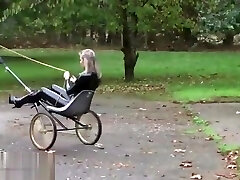 Ponygirl pull the carriage of dominatrix