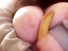 Banana between the mammories