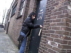 Sucking a fuck-stick through a glory hole after frolicking with her snatch Sucking a fuck-stick through a glory hole after frolicking with her snatch