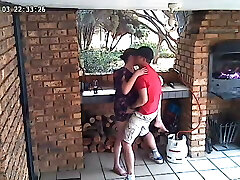 Spycam: CC TV self catering accomodation couple nailing on front porch of nature reserve 