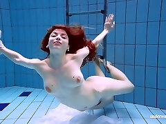 Redhead Marketa In A White Dress In The Pool
