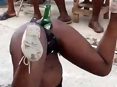Jamaican chick fucking with a bear bottle