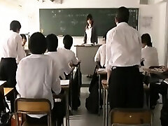 Busty Japanese schoolteacher gets handled like a slut by a gang o