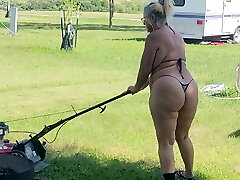 Got back to find wifey mowing in a panty bikini, her ass and thighs shaking with every step 