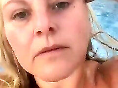 Kitty Queen - Just Naked Swimming - Blonde BBW Cougar swimming in the pool