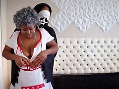 Mature ebony in a nurse uniform gets pounded by a BBC in mask